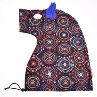 Protective suit Alice laid flat, black with red, orange and turquoise circle patterns, a blue ear, eye opening and drawstring