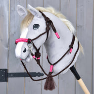 Grey Hobby Horse wearing Rope set Noir Cocoa: dark brown rope halter with a pink noseband, reins and a neck ring with tassel