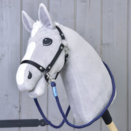 Light grey Hobby Horse in a black halter wearing the navy Reins Blues with light blue wraps around its neck