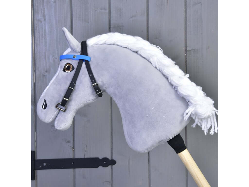Hobby Horse Bridle with Blue Headband by LarDen on a grey plush head with a long braided white yarn mane