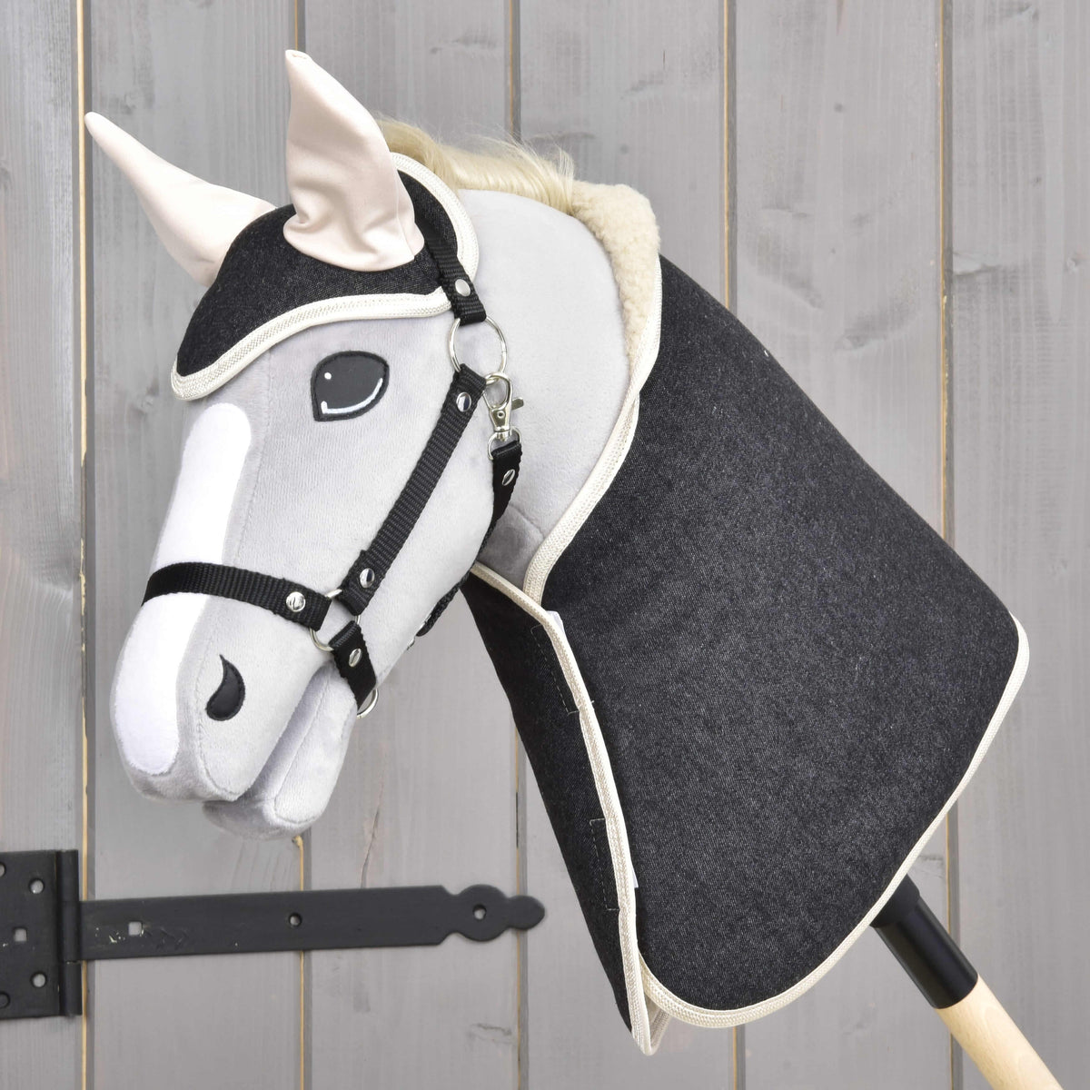 Grey plush Hobby Horse with a cream mane wearing the dark denim Set Blue Denim with beige ears and a black halter