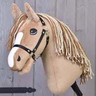 Hobby Horse Bren with Black Halter by LarDen, a tan plush head with a white blaze and brown and cream yarn mane