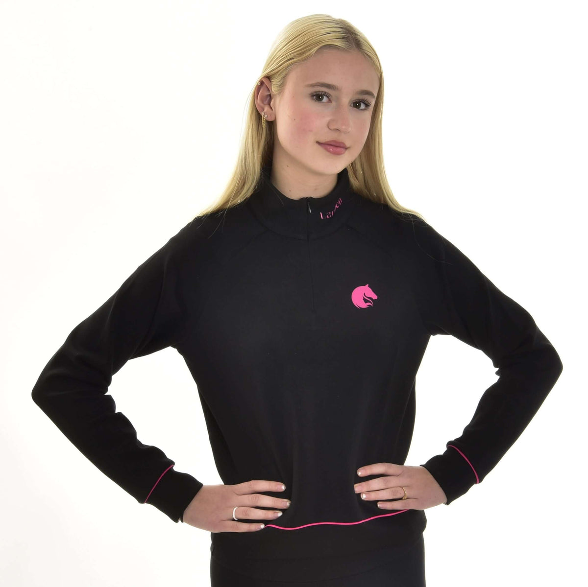 Blonde girl with hands on hips in the black Hobby Horse sweatshirt, pink horse head logo on the chest and pink piping