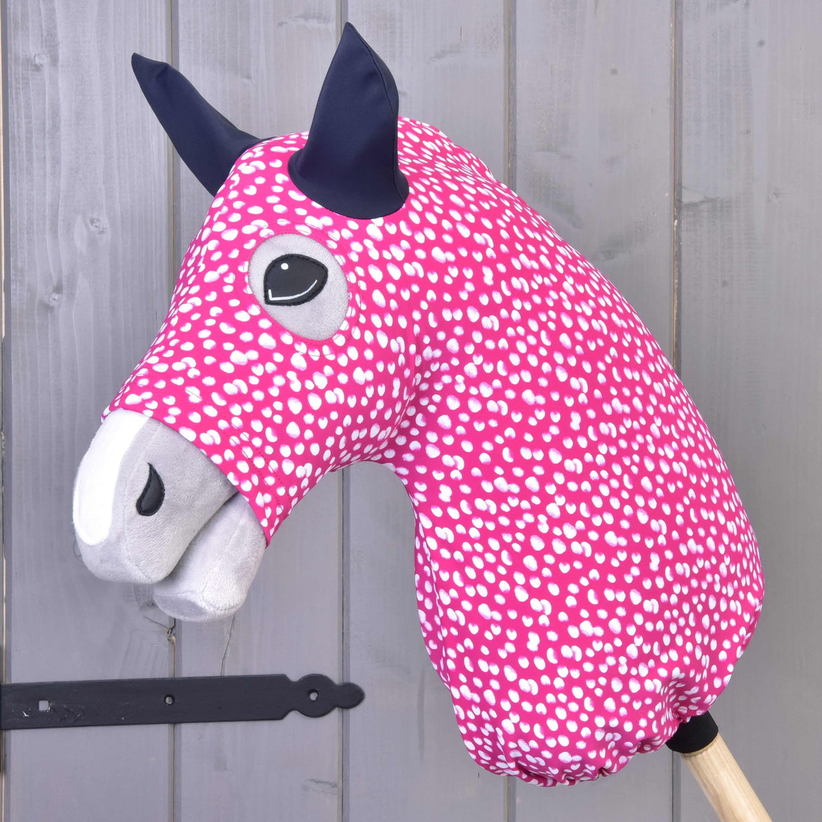 Hobby Horse Protective suit Minie (Lycra) by LarDen fitted over the head, hot pink with white spots and navy ears