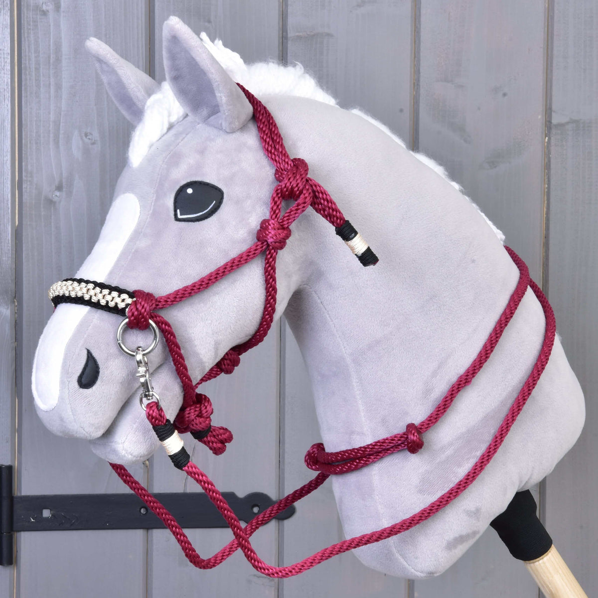 Grey plush Hobby Horse wearing Rope set Burgundy: burgundy rope halter and reins, black and cream braided noseband