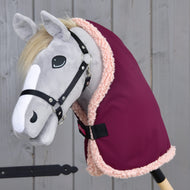 Grey Hobby Horse with a blond mane and black halter wearing the Stable Blanket Royal Burgundy with pale pink fleece edging
