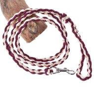 LarDen Hobby Horse Knitted Lead Rope Maroon, a braided maroon and cream paracord lead with silver snap hook on wood