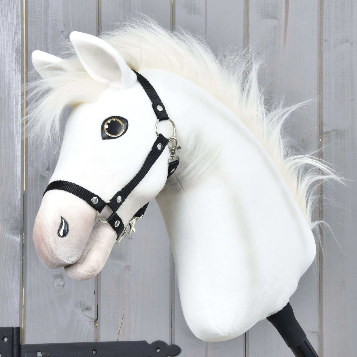 Hobby Horse Nexus with Black Halter by LarDen, a white plush head with a fluffy white mane and a softly shaded muzzle