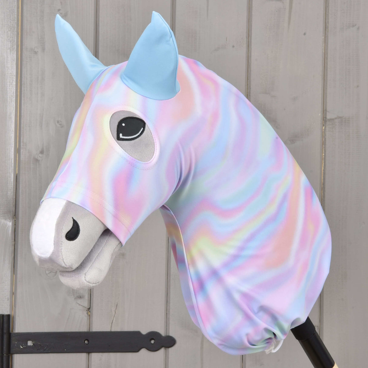Hobby Horse Protective suit Rainbow (Lycra) by LarDen in pastel rainbow swirls with light blue ears, on a grey Hobby Horse