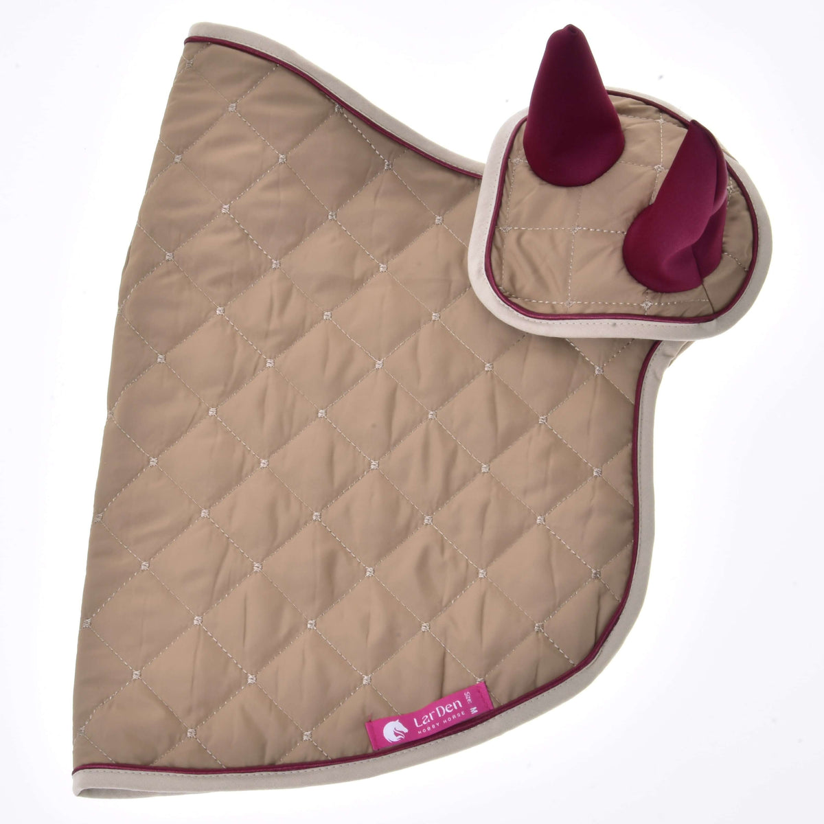 Beige quilted blanket and ear bonnet of the Hobby Horse Set Roma laid flat with burgundy piping and pink LarDen label