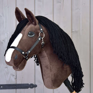 Hobby Horse Sisi with Black Halter by LarDen, a dark brown plush head with a white blaze and long black yarn mane