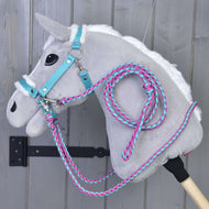 Light grey Hobby Horse in the turquoise halter with white fur, with braided pink and turquoise reins and lead rope