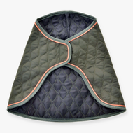Hobby Horse Blanket Sport by LarDen, olive green quilted blanket with orange piping, opened to show the navy lining