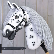 Hobby Horse Chantal with Black Halter by LarDen, a white plush head with black spots and a long grey yarn mane
