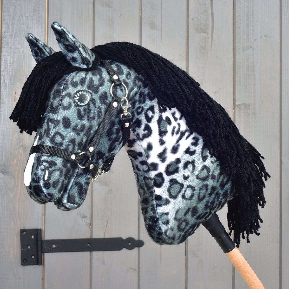 Hobby Horse Picasso with Black Halter by LarDen, grey leopard-spotted plush with a white blaze and long black yarn mane