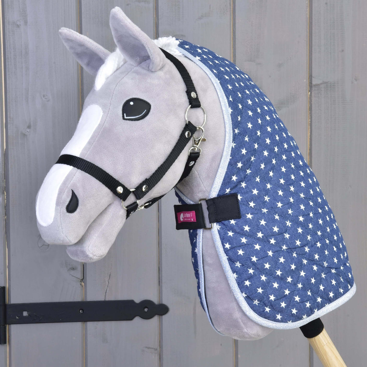 Hobby Horse Stable Blanket Star by LarDen on a grey plush horse, navy quilted with white stars and silver glitter edging