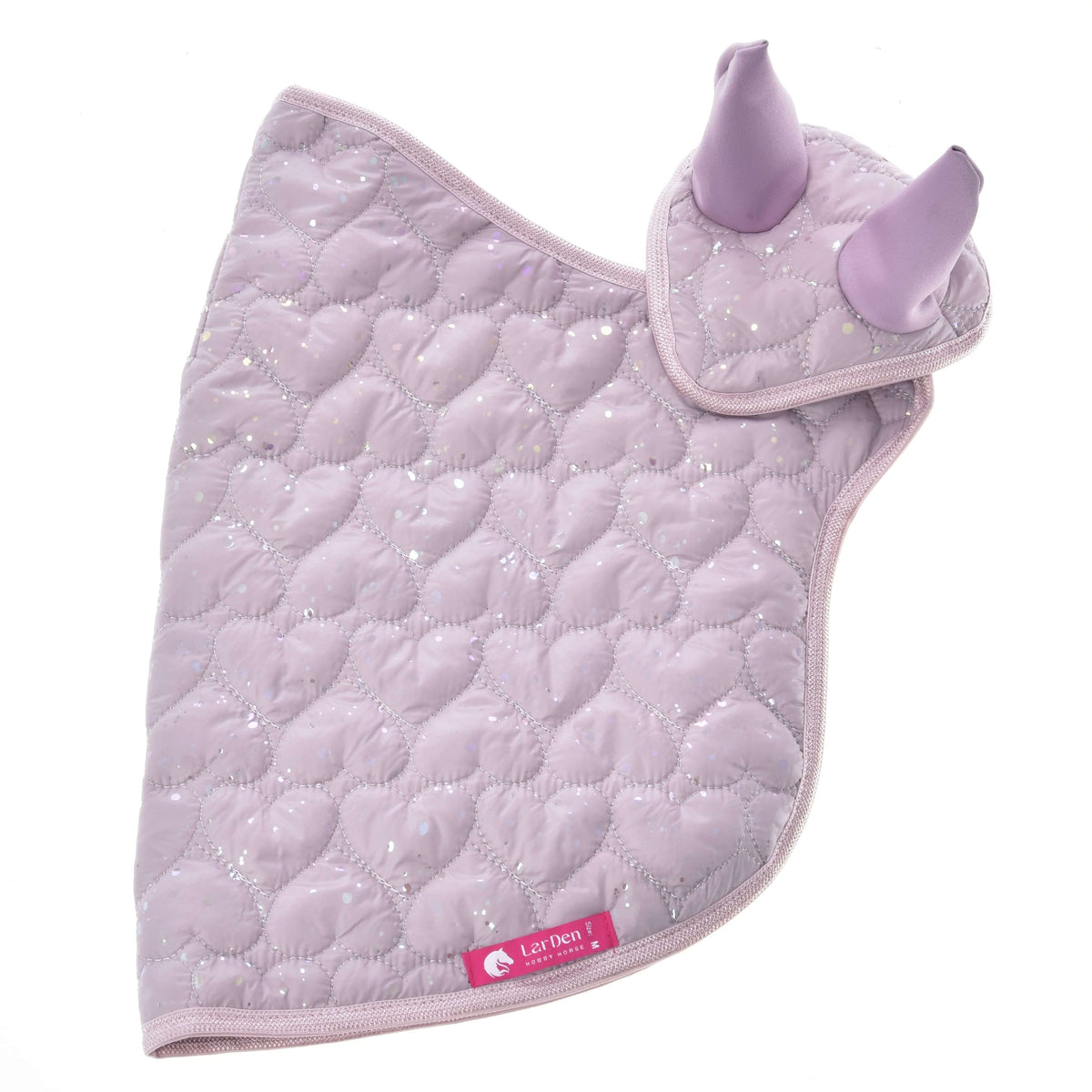 Lilac quilted blanket and ear bonnet laid flat, heart stitching with iridescent glitter and a pink LarDen label