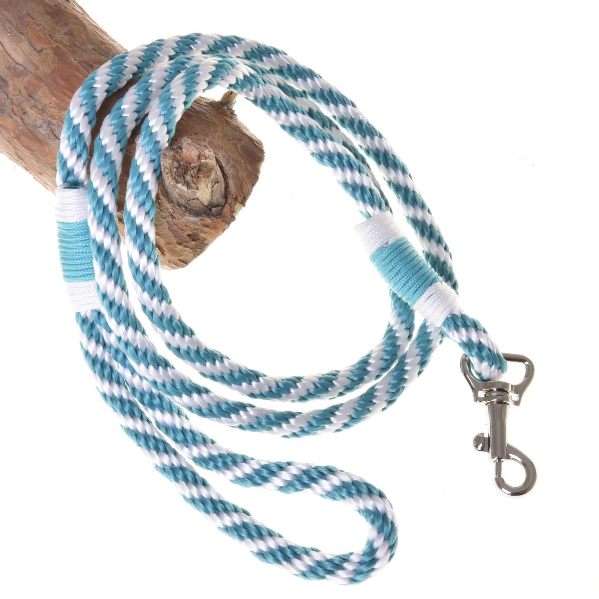 LarDen Hobby Horse Lead Rope Turquoise Stripe, white and turquoise braided lead with silver snap hook on a wooden branch
